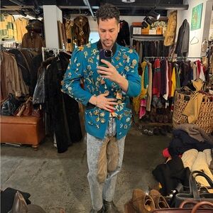 Vintage Teal Jacket with over 100 vintage Brooches